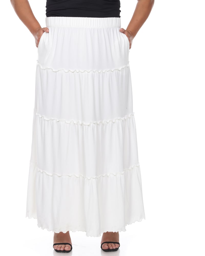 Front of a model wearing a size 1X Tiered Maxi Skirt in White by White Mark. | dia_product_style_image_id:249347
